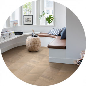 Quick-Step-hardwood-INT3903-chevron-living-room-floor-570x570